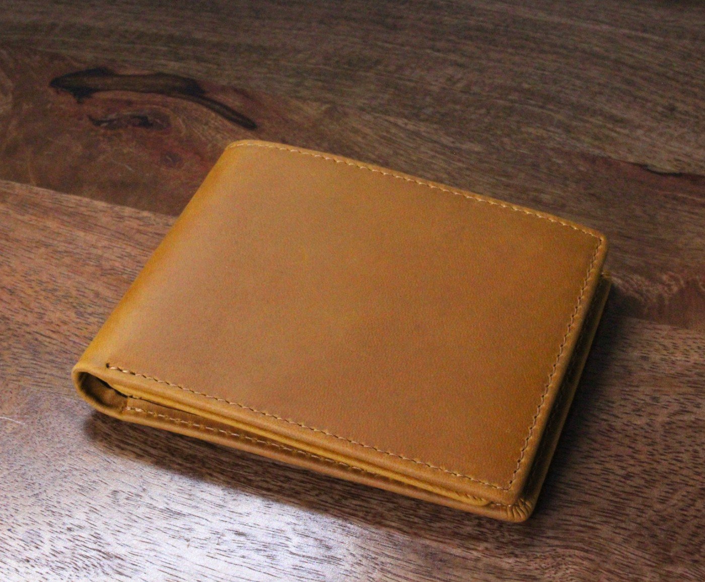 The same saddle-tan wallet without engraving